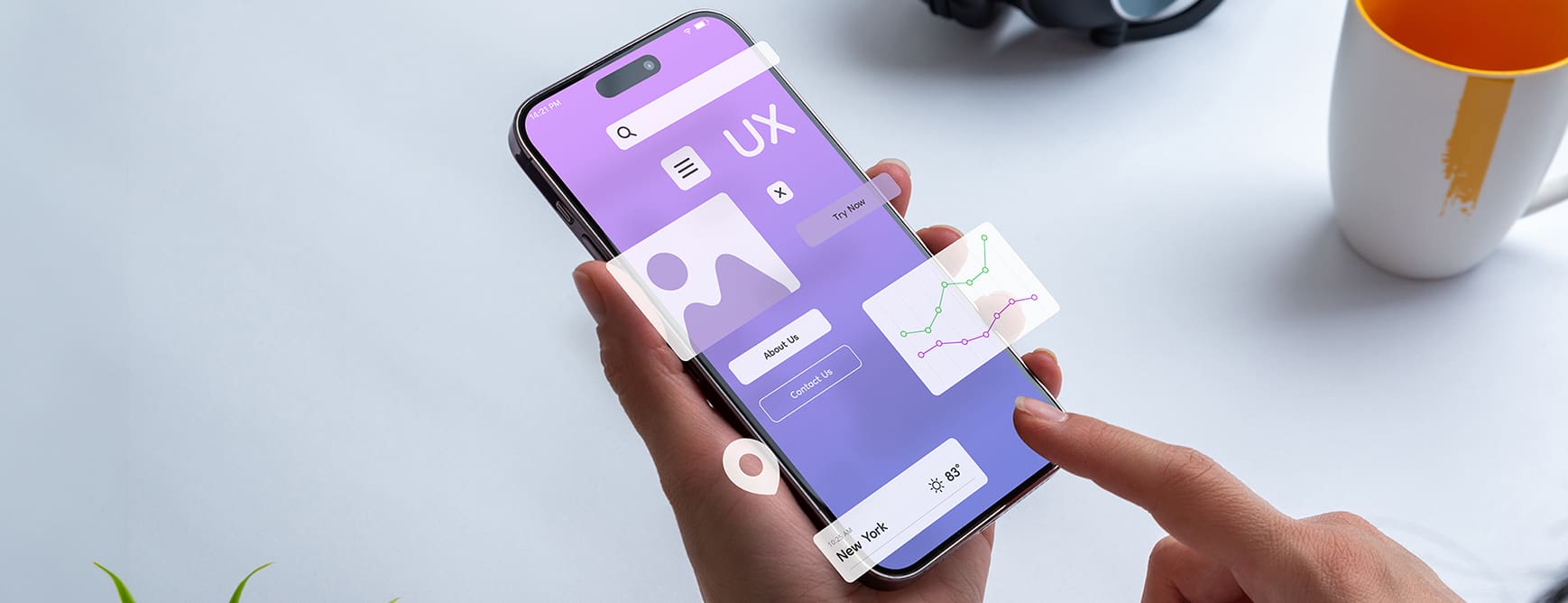Person holding a mobile phone with UX Design elements