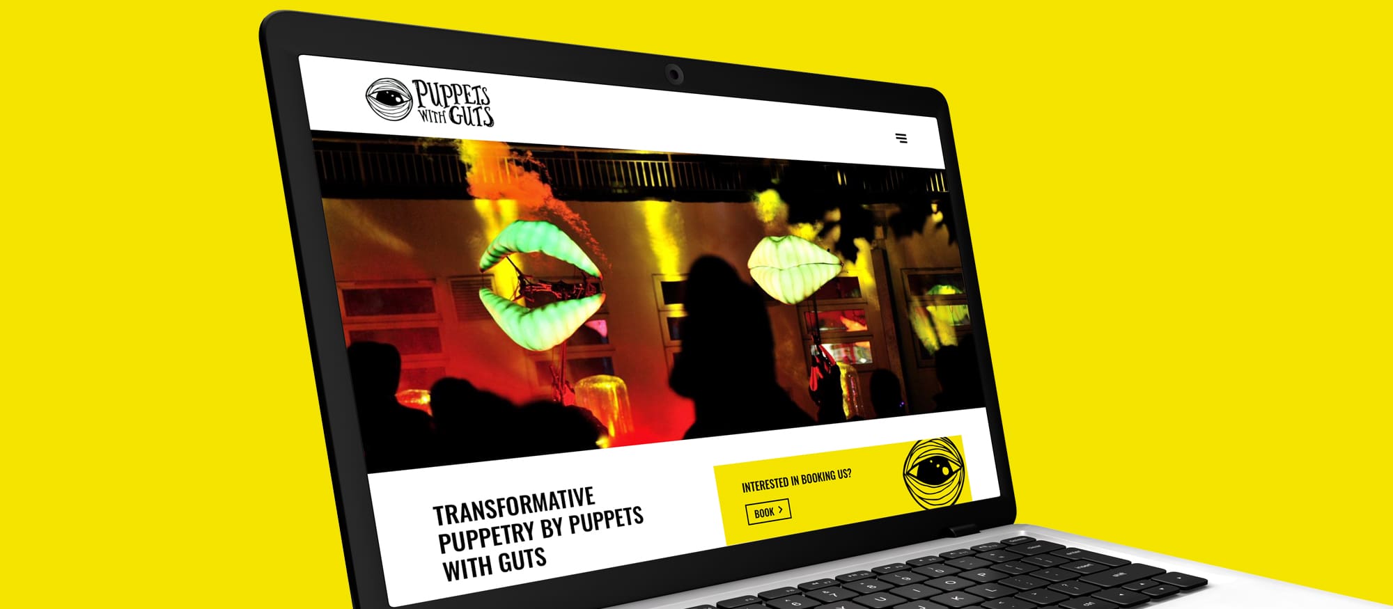 Puppets With Guts website on laptop screen