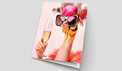 The power of print for businesses - card with a bird wearing sunglasses and holding a glass of champagne